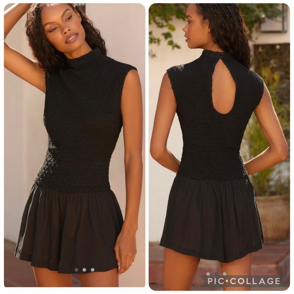 Large Anthropologie Popcorn Textured Romper black smocked fitted dress shorts